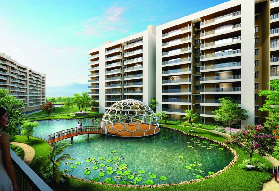Render of Kaveri Towers beside the landscaped lake at River Valley Township (2024)