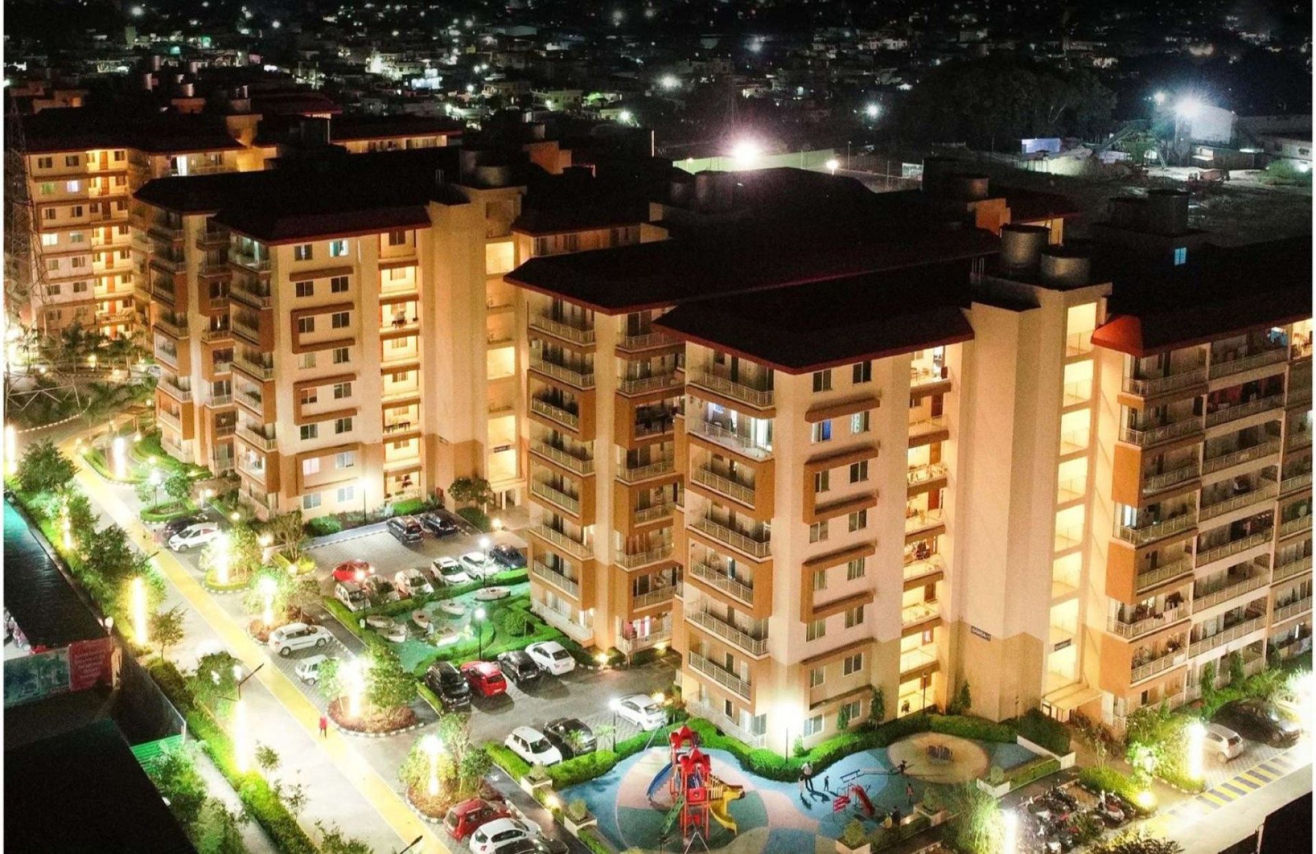 Bhagirathi and Ganga Towers lit up at night, River Valley Township