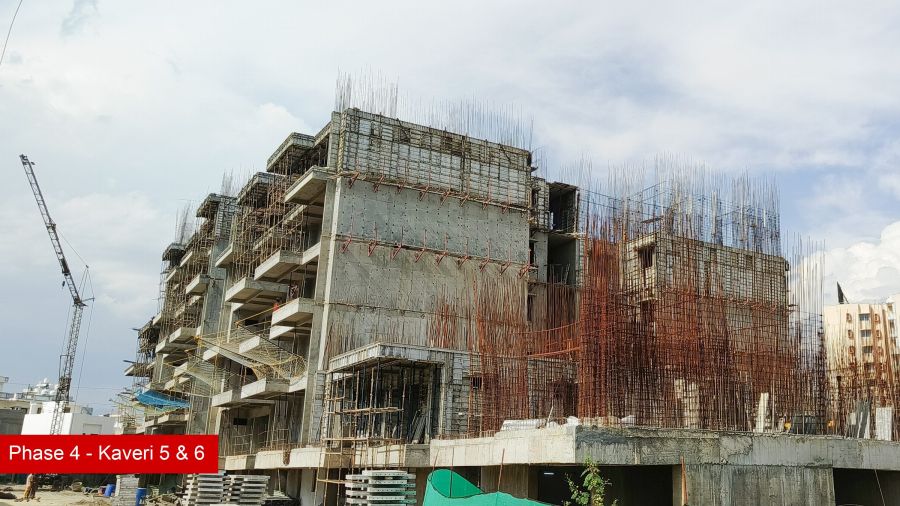 Construction progress at Kaveri Towers 5 and 6, River Valley Township, April 2026: reinforcement on the upper floors