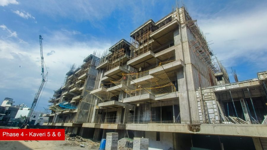 Construction progress at Kaveri Towers 5 and 6, River Valley Township, April 2026: tower crane at work on Kaveri 5 and 6
