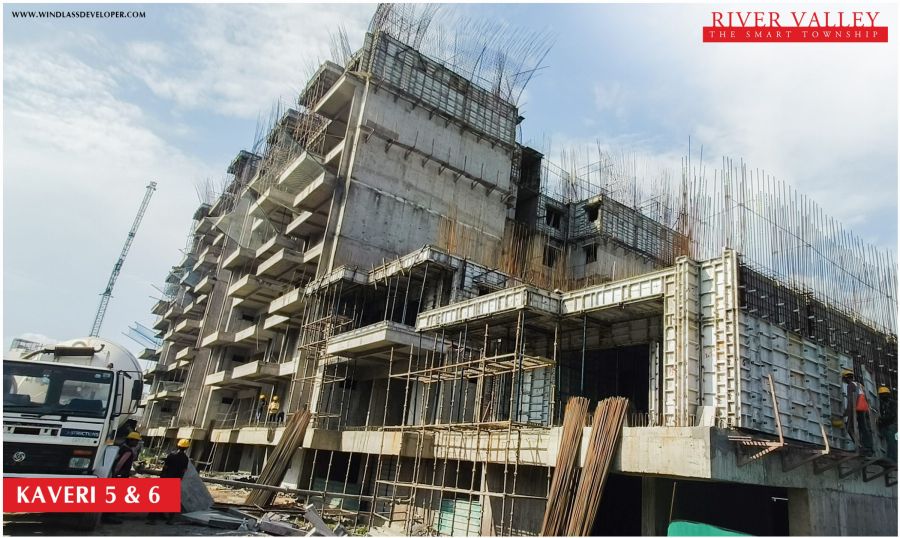 Construction progress at Kaveri Towers 5 and 6, River Valley Township, June 2026: mivan shuttering at the podium level