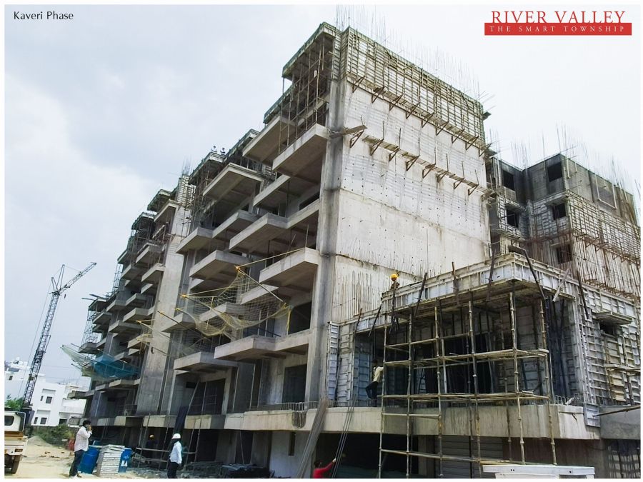 Construction progress at Kaveri Towers 5 and 6, River Valley Township, May 2026: corner view of Kaveri 5 and 6